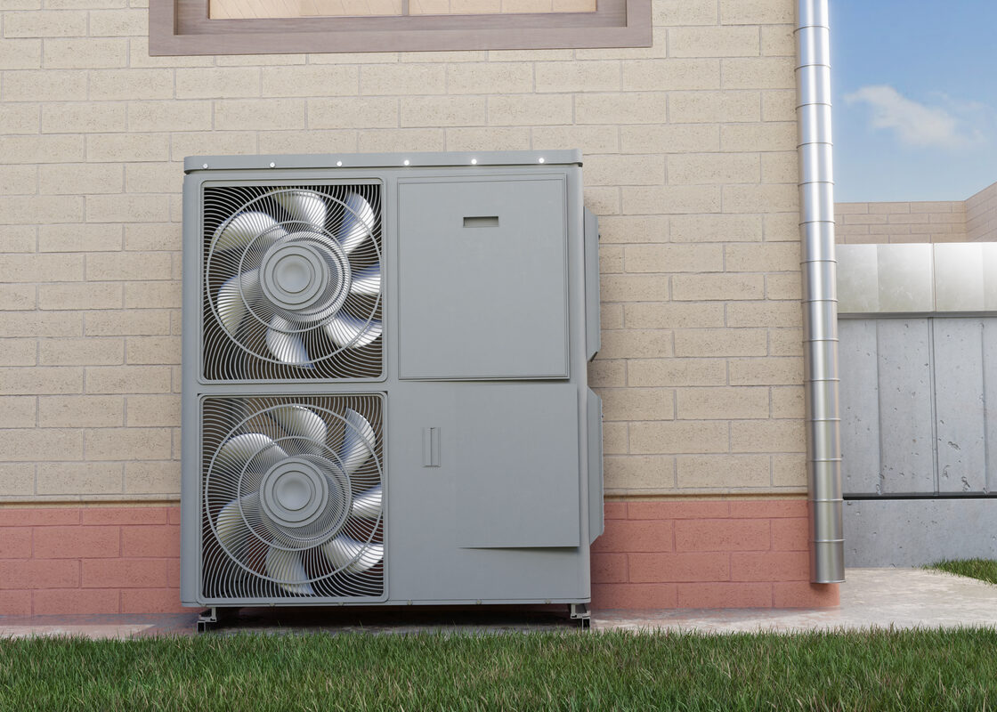 Modern residential heat pump unit installed outside a home